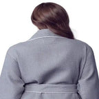 Back view of lightweight grey women’s waffle piping bathrobe by Lotus Linen, spa-style comfort with small piping details.