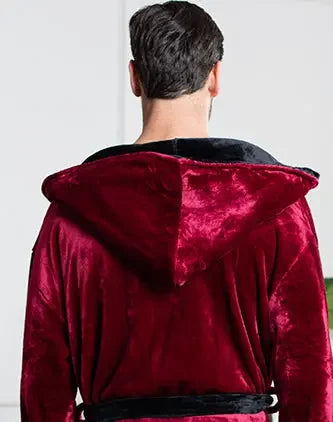 Back view of Lotus Linen men's hooded robe featuring plush burgundy and black fabric, showcasing its cozy hood and comfortable fit.