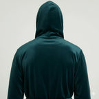 Green and black men's hooded robe by Lotus Linen, featuring plush soft fabric and a cozy back view with small hood.