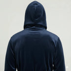 Back view of Lotus Linen men's hooded robe in dark grey plush fabric, showcasing its soft, cozy material and comfortable fit.