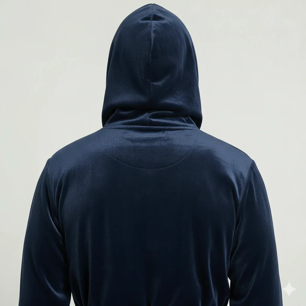 Back view of Lotus Linen men's hooded robe in navy and burgundy plush fabric, showcasing the cozy, ultra-soft interior and hood design.