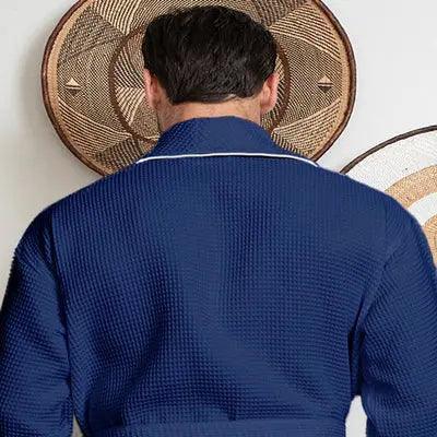 Navy men's waffle piping robe by Lotus Linen, back view showing small size and piping details on the robe.