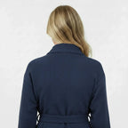 Back view of Lotus Linen navy knee-length waffle robe for women, showcasing the textured fabric and relaxed fit.