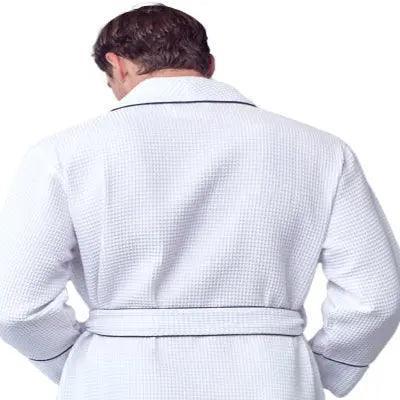 Back view of Lotus Linen men's premium waffle piping robe in small white with contrasting piping details.