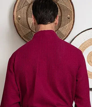Back view of Lotus Linen men's waffle spa bathrobe in small wine red, lightweight and absorbent fabric.