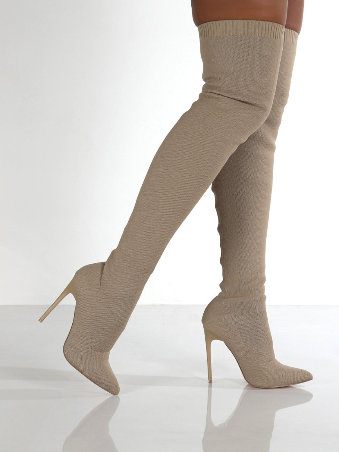 Point toe over knee stiletto boots in beige, high heel, sophisticated style.