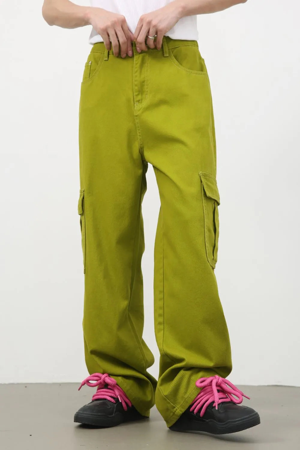 Men's mid-rise cargo pocket jeans from Plush Fashion Hub, showing the relaxed fit, multiple cargo pockets, and classic denim style.