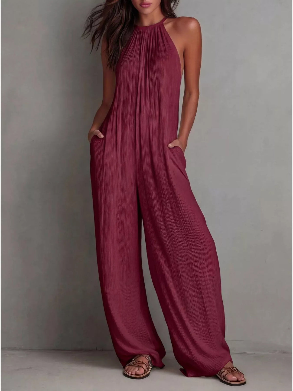 Plush Fashion Hub sleeveless wide-leg jumpsuit with a relaxed fit, featuring a stylish and comfortable design.
