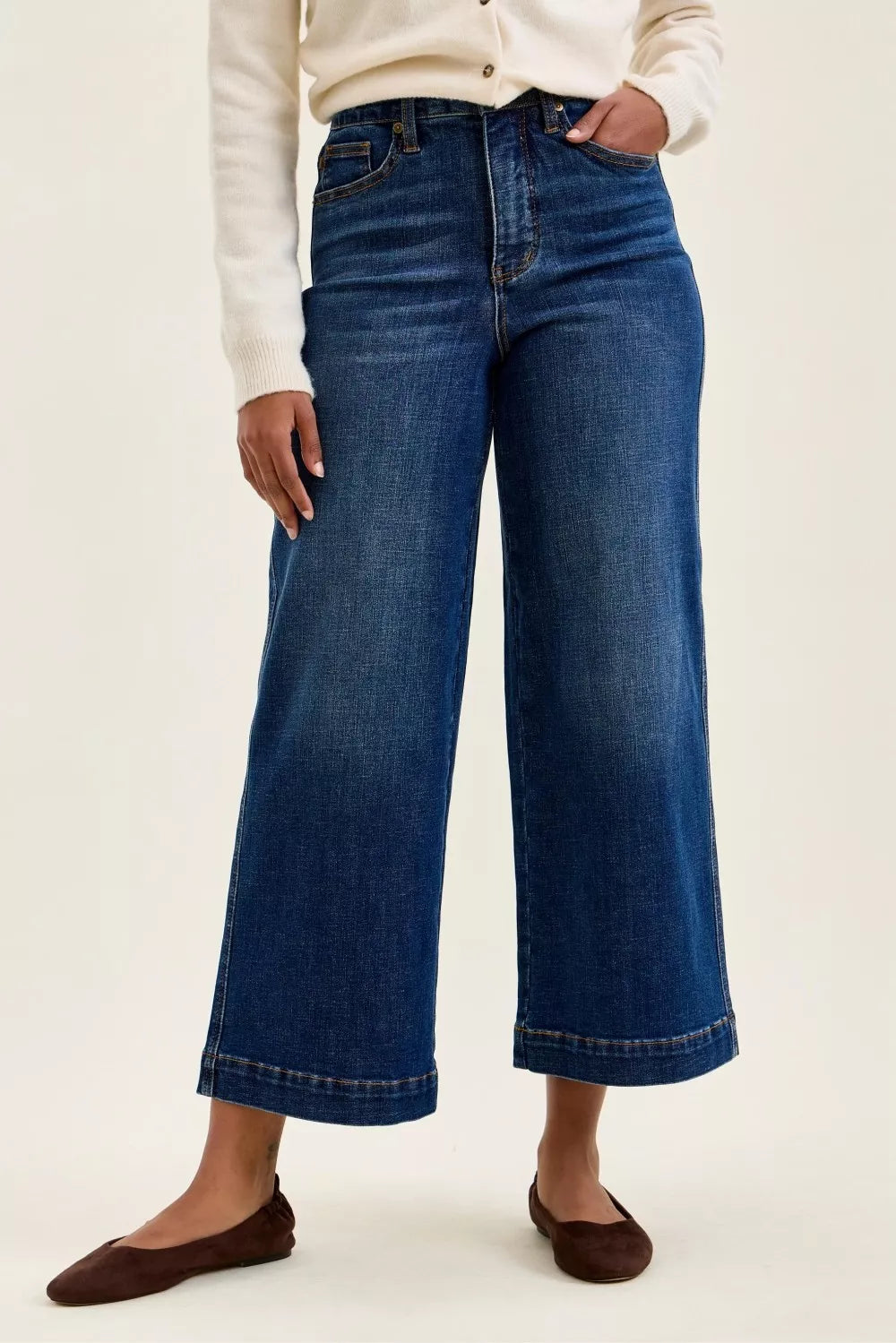 Plush Fashion Hub Judy Blue high waist T.C. Claudia ankle wide jeans with a dark wash and relaxed fit, displayed on a hanger.