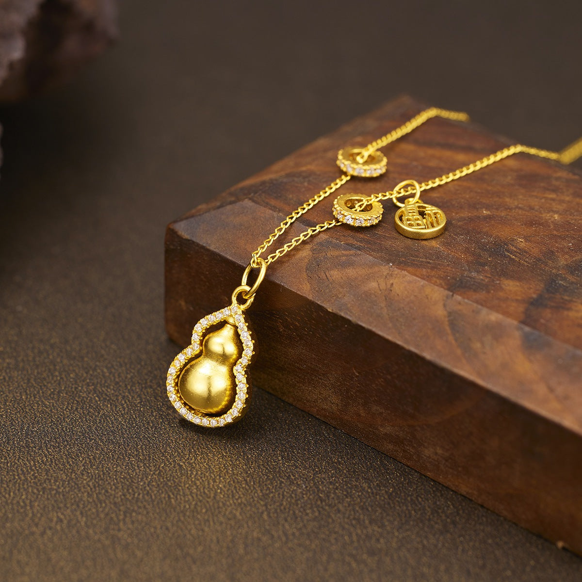18K gold-plated gourd pendant necklace with a delicate chain, stylish jewelry accessory from Plush Fashion Hub.