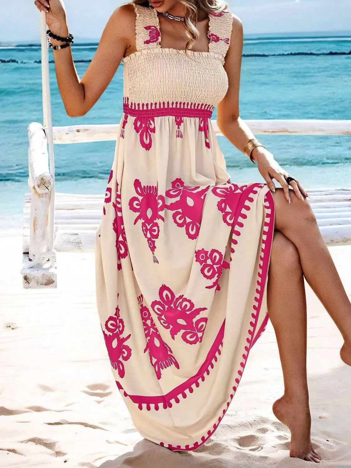 Plush Fashion Hub smocked printed wide strap maxi dress featuring a flowing silhouette and vibrant floral pattern.