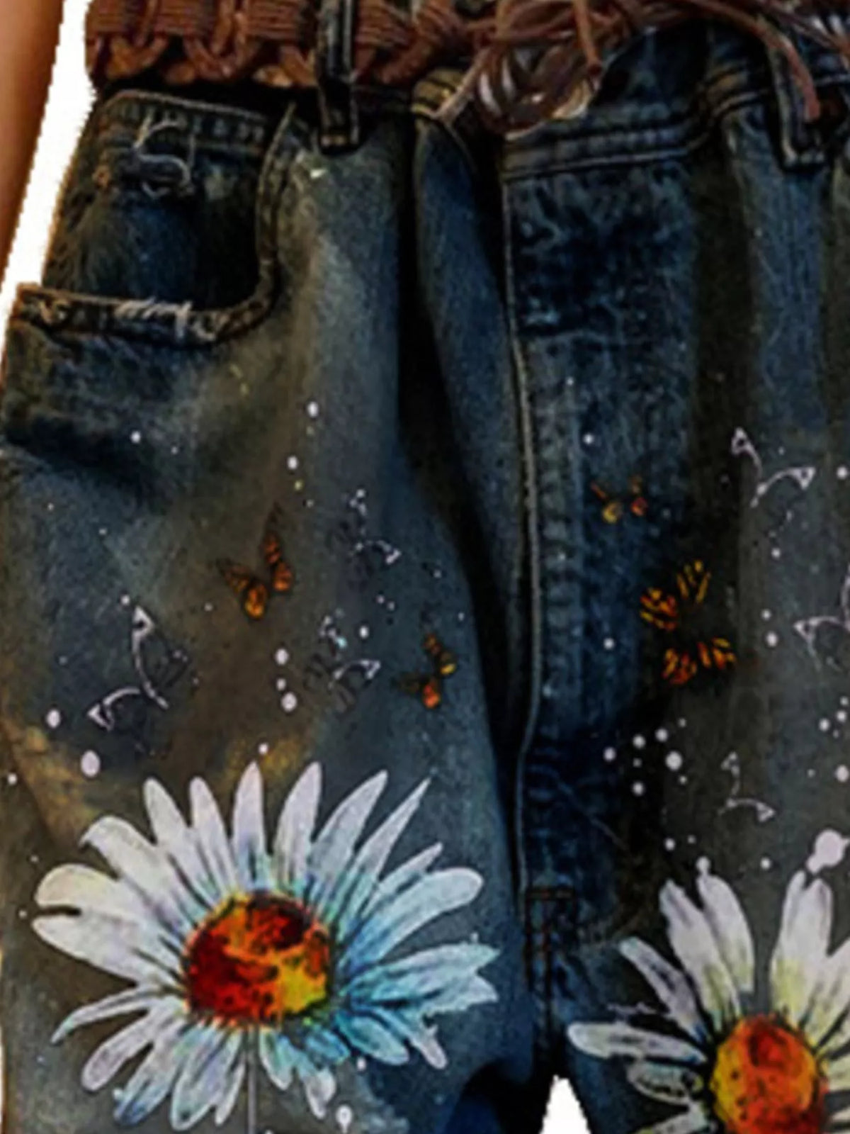 Full size floral distressed cropped jeans by Trendsi, showcasing a trendy plus size denim style with floral embroidery and ripped details.