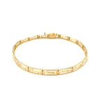 14k yellow gold Greek fret design fancy bracelet with intricate pattern, showcasing elegant craftsmanship and detailed jewelry craftsmanship.