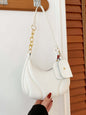 PU Leather Shoulder Bag with EarPods bag in white hanging on a hook.