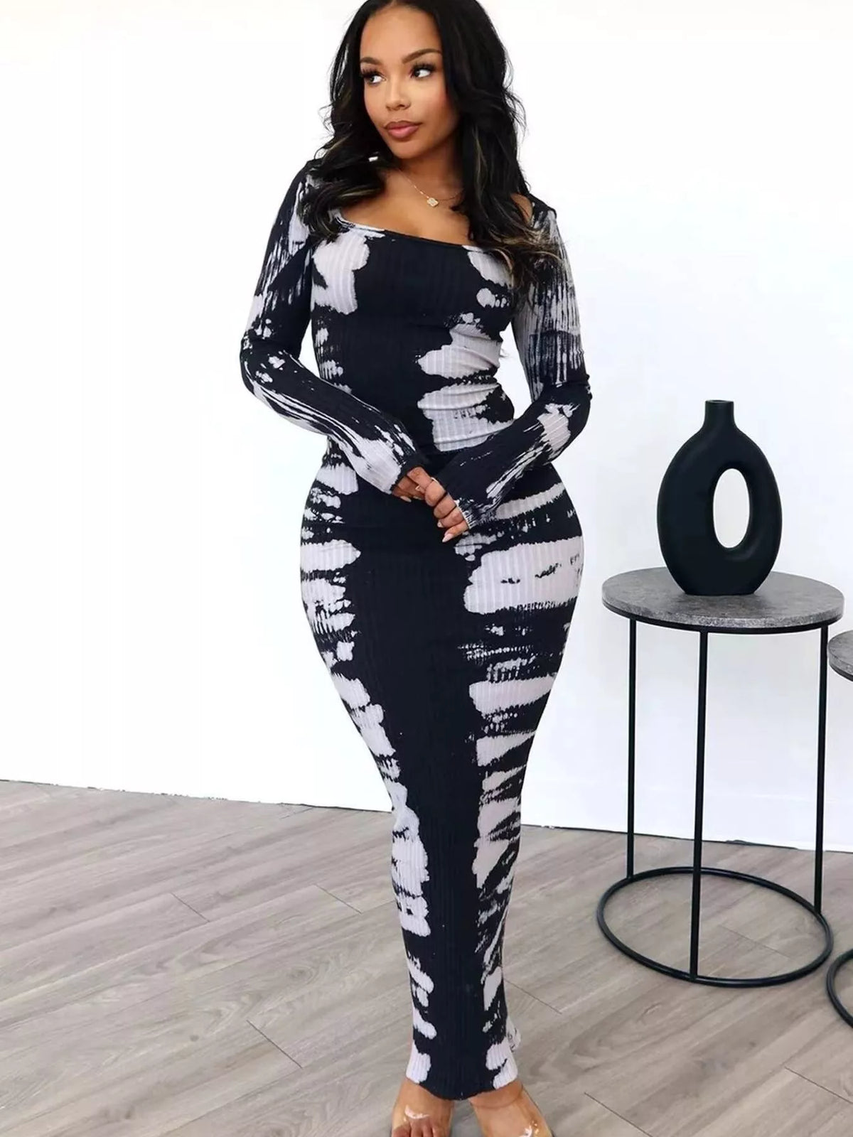 Colorful tie-dye long sleeve maxi dress by Plush Fashion Hub, flowing fabric with vibrant patterns and a comfortable fit.