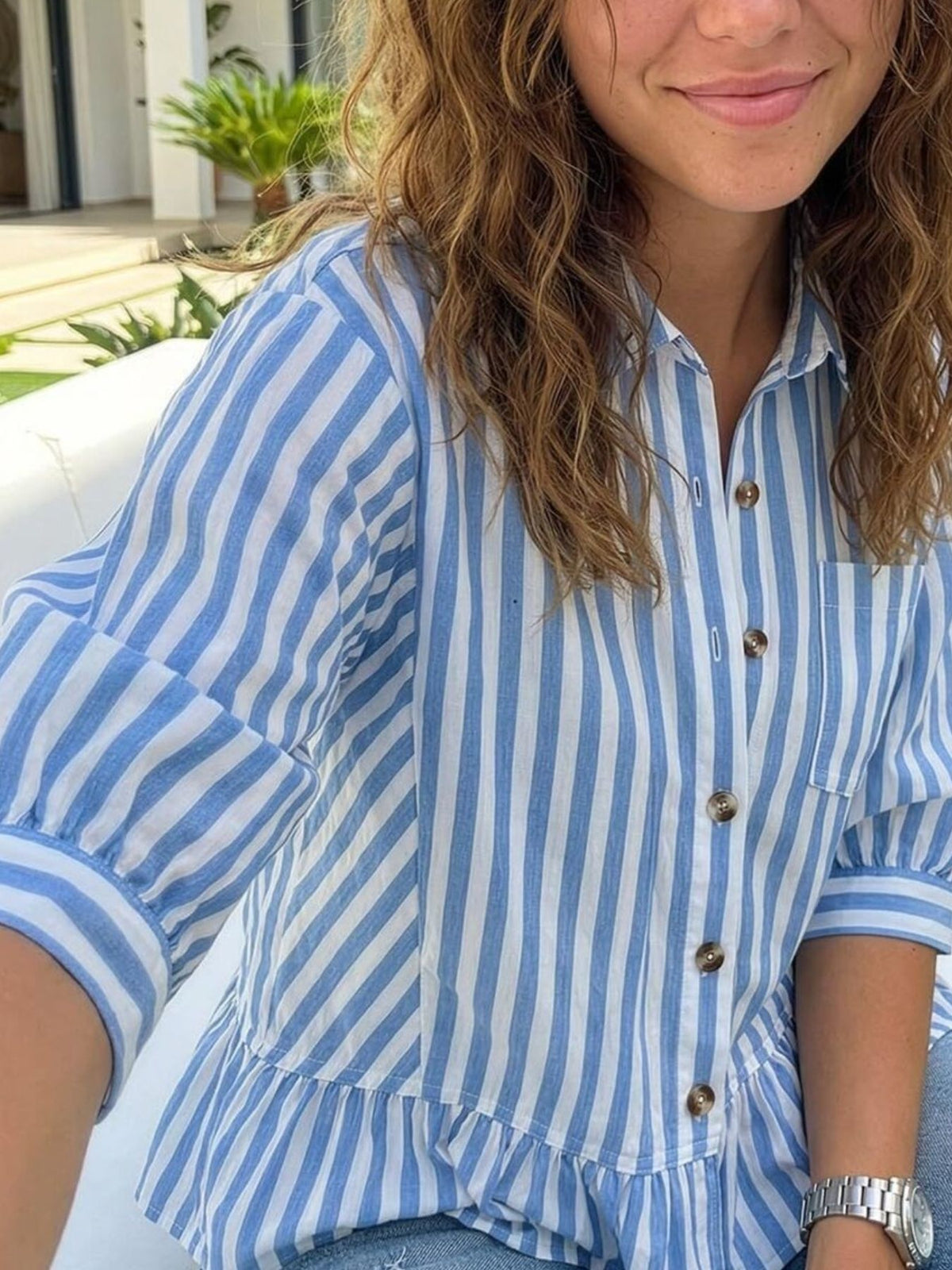 Women’s striped button-down blouse by Plush Fashion Hub, lightweight viscose with ruffled hem and stylish design.