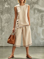 Plush Fashion Hub women's tank top and wide-leg pants set with side split, pockets, and buttons, shown on a model.
