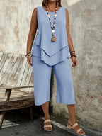 Casual solid-colored sleeveless top and cropped pants two-piece set by Plush Fashion Hub, featuring comfortable casualwear style.