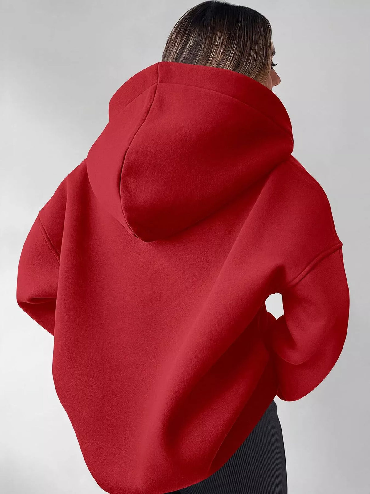 Oversized quarter-zip hoodie from Trendsi in soft fabric, featuring a relaxed fit, high collar, and casual style.