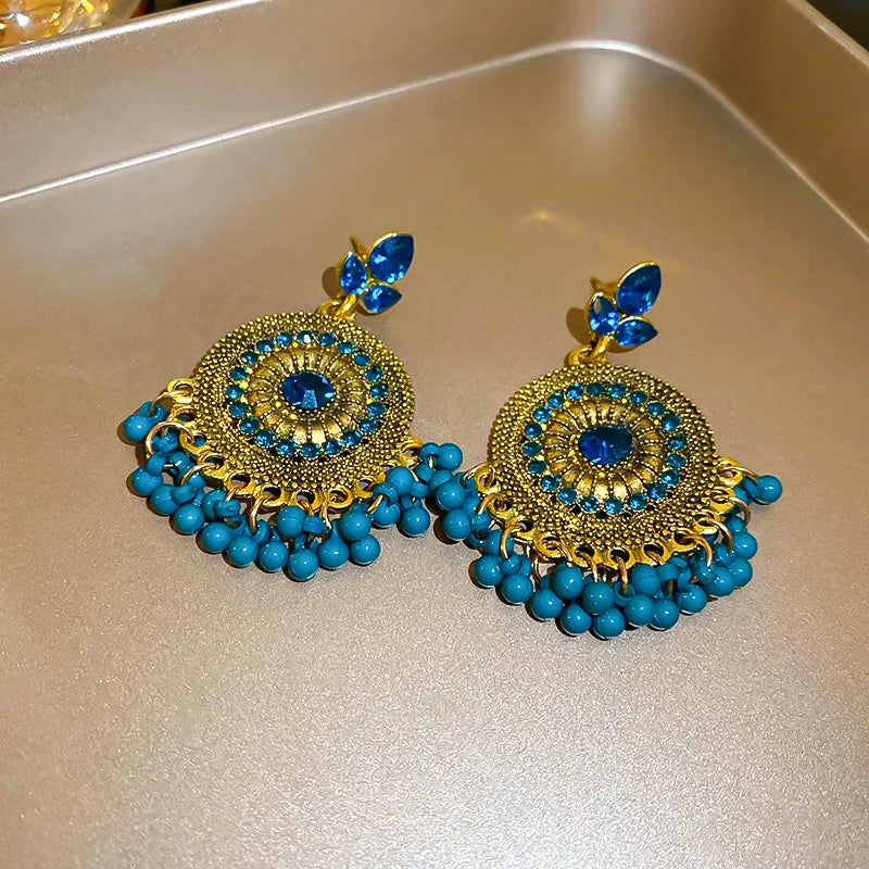 Rhinestone alloy bead dangle earrings with sparkling stones and intricate design, perfect for stylish fashion accessories.
