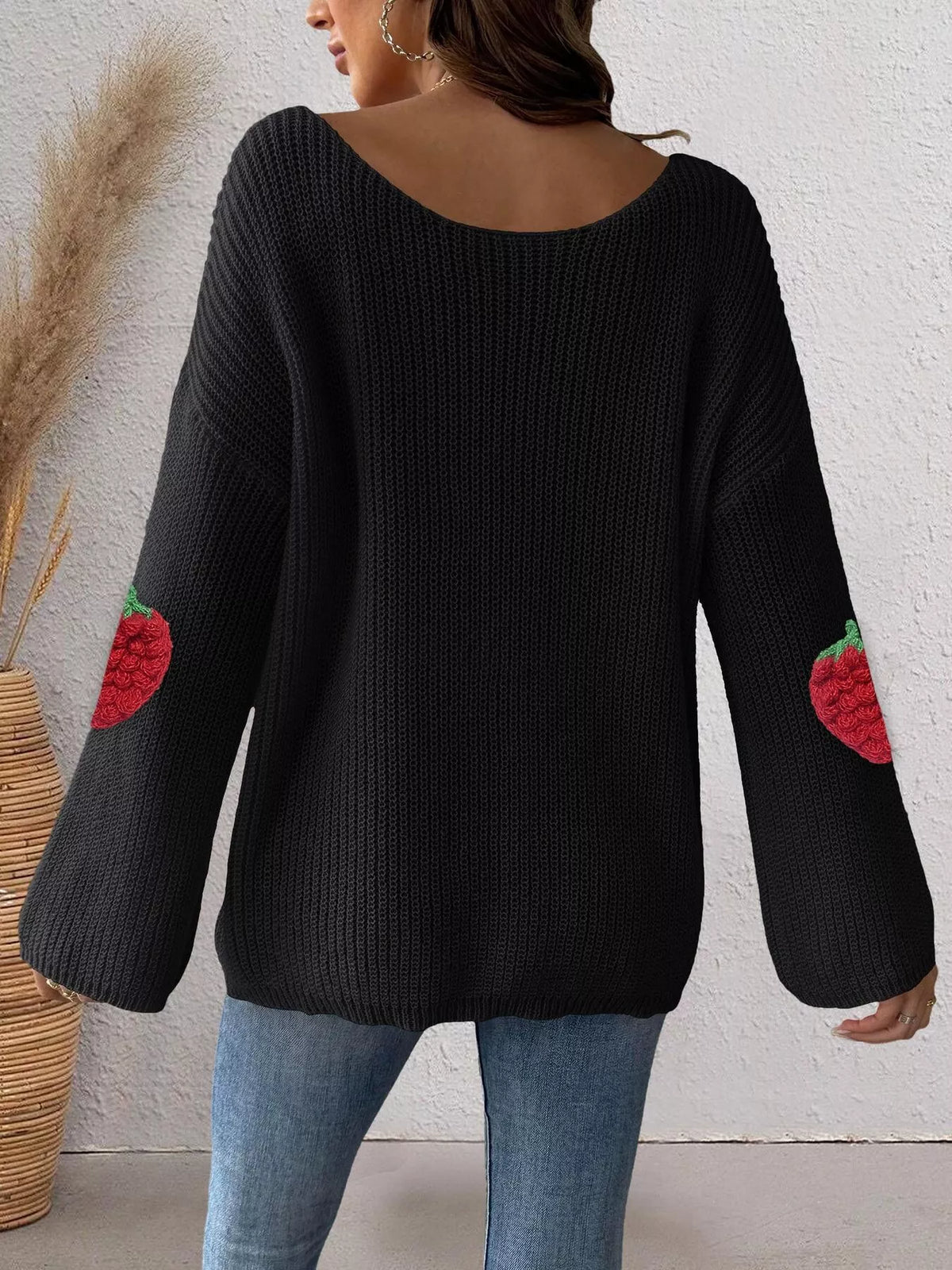 Pink oversized sweater with strawberry applique, trendy and cozy, from Trendsi, perfect for casual wear.