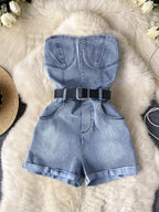 Plush Fashion Hub strapless denim romper with pockets, full-body suit, featuring a casual sleeveless design and front pocket details.