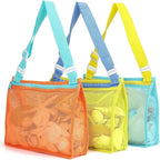 Perfecsy mesh beach toy bag with shell design, ideal for kids to store sand toys and swimming accessories at the beach.