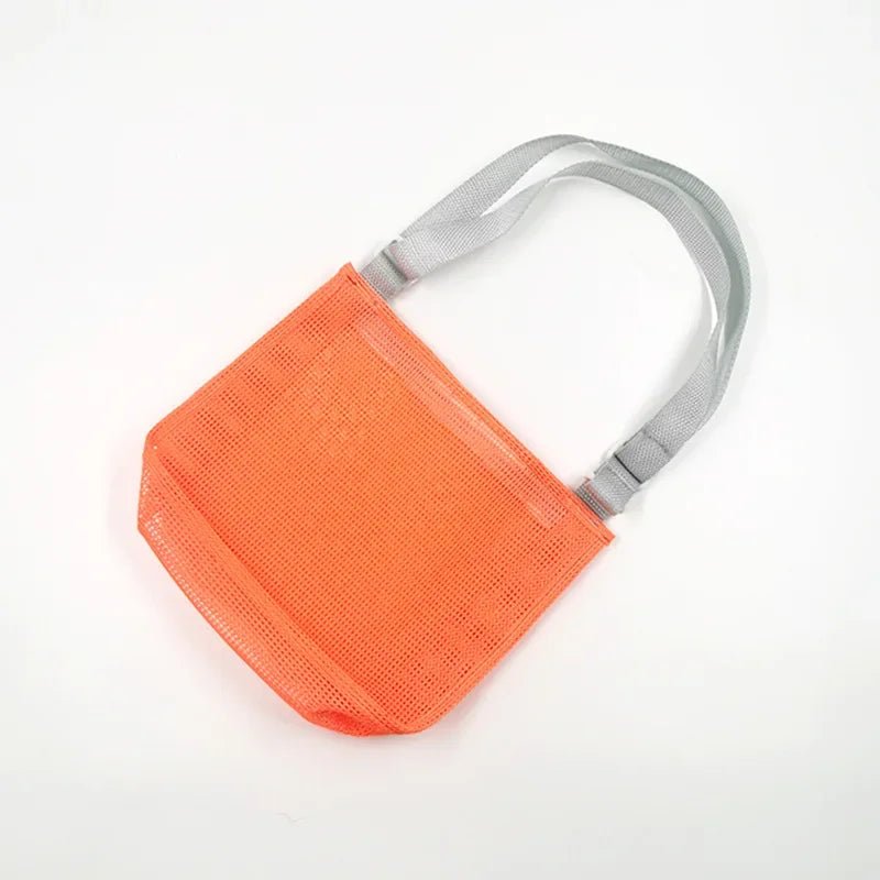 Plush Fashion Hub beach toy mesh bag with seashell design, ideal for storing sand toys and swimming accessories for kids.