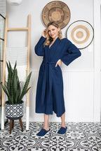 Lightweight Lotus Linen women's waffle robe with quick-dry spa comfort, shown hanging open to display soft fabric and relaxed fit.