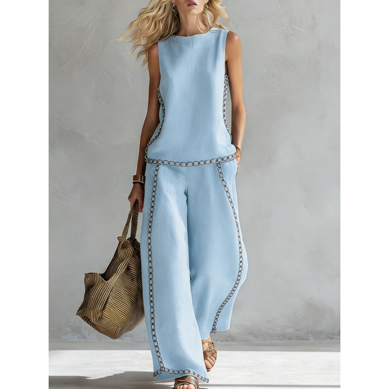 Printed retro sleeveless top and wide-leg pants set by FitiqueFit, featuring vibrant 12-print design in various sizes.