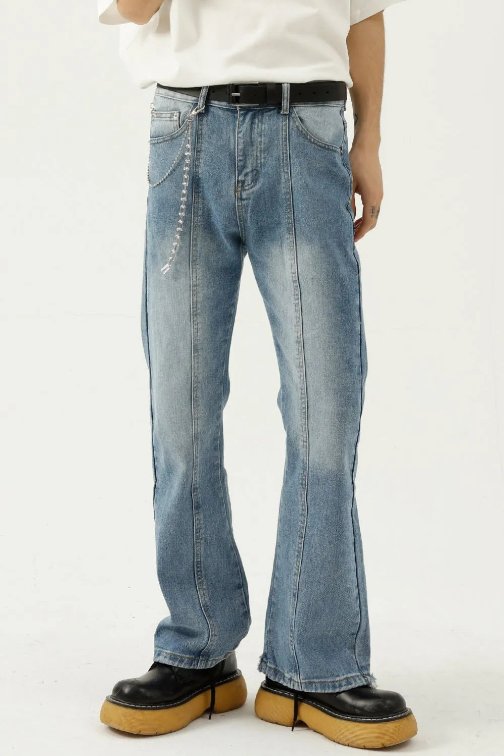 Raw hem denim jeans with pockets from Plush Fashion Hub, showing the distressed hem detail and classic five-pocket design.