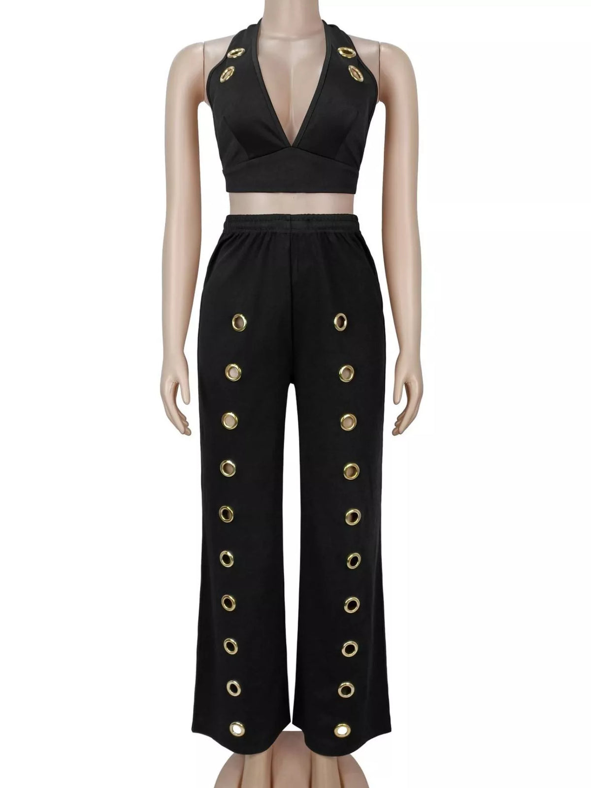 Eyelet crop top and wide-leg pants set by Trendsi, featuring a stylish crop top with eyelet details and matching flowy pants.