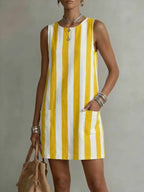 Women's striped color-block sleeveless mini dress by Plush Fashion Hub, casual loose-fit dress with bold stripes and vibrant colors.