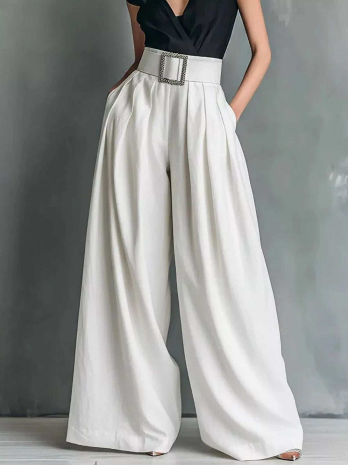 High-waisted wide-leg pants from Plush Fashion Hub, featuring a relaxed fit and stylish design, shown on a model.
