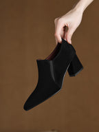 Women's suede pointed toe chunky heel pumps with deep vamp and low heel, in a stylish footwear design by Plush Fashion Hub.