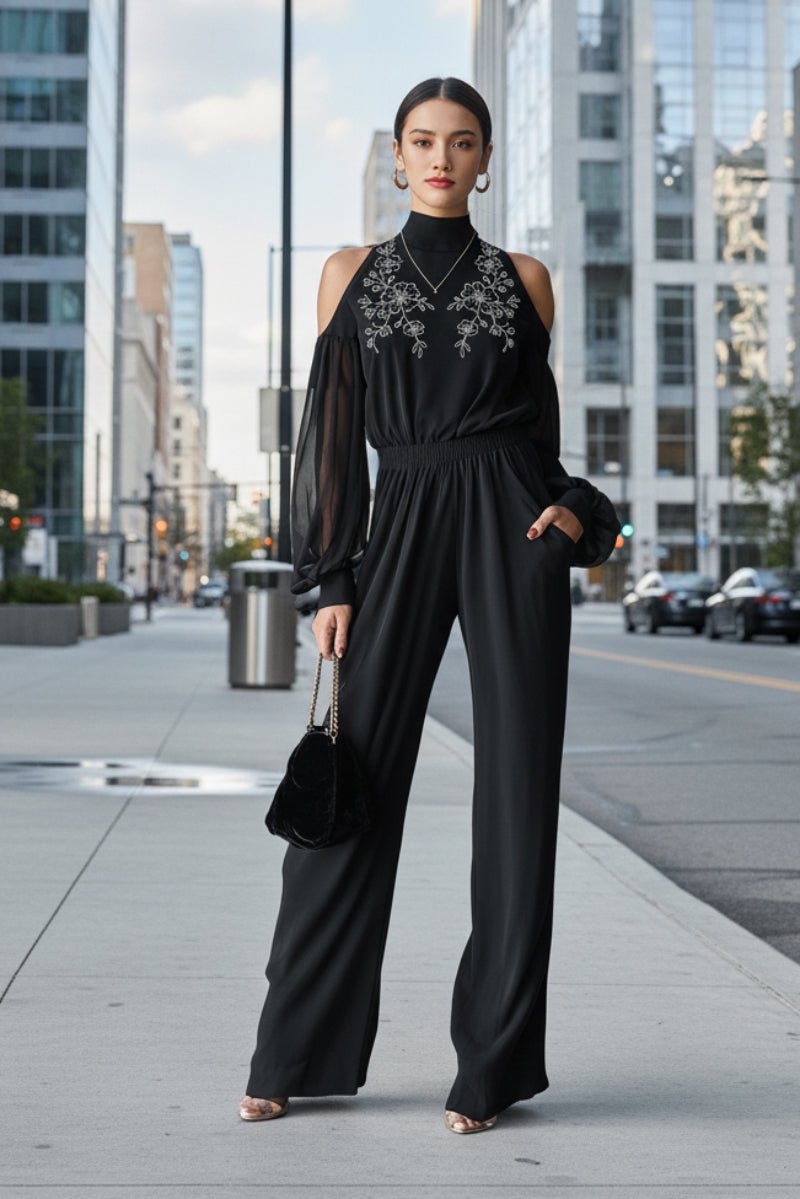 Black embroidered women's long-sleeve wide-leg jumpsuit from FitiqueFit, featuring casual style and relaxed fit with detailed embroidery.