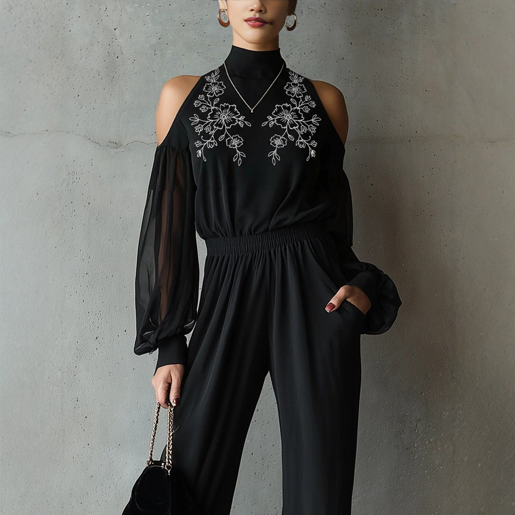 Black embroidered women's long-sleeve wide-leg jumpsuit by FitiqueFit, showcasing a stylish casualwear outfit with intricate embroidery details.