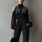 Black embroidered women's long-sleeve wide-leg jumpsuit by FitiqueFit, showcasing a stylish casualwear outfit with intricate embroidery details.