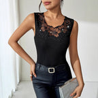 Black ribbed vest T-shirt top with rhinestone decorations, casualwear by FitiqueFit, shown on a neutral background.