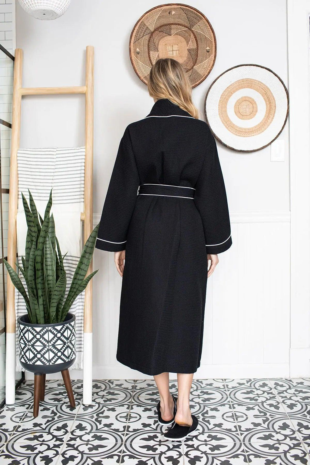 Black women's waffle piping bathrobe by Lotus Linen, lightweight spa-style robe with comfortable waffle texture.