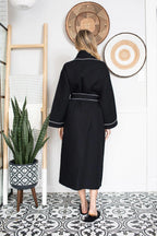 Black women's waffle piping bathrobe by Lotus Linen, lightweight spa-style robe with comfortable waffle texture.