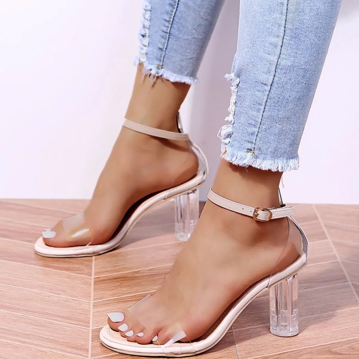 Women's faux leather block heel ankle strap sandals by Plush Fashion Hub featuring stylish design and adjustable ankle strap.