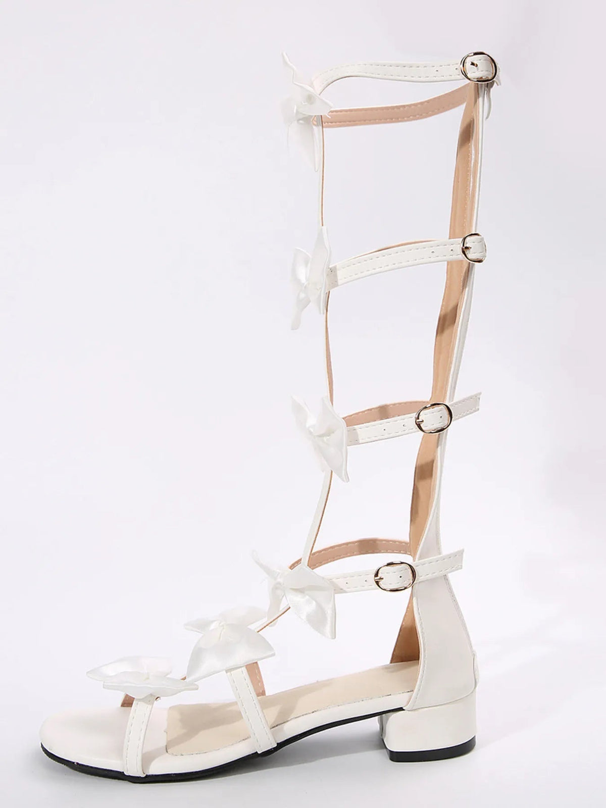Elegant women's slip-on dress sandals with bow detail and low heels by Plush Fashion Hub, perfect for stylish occasions.