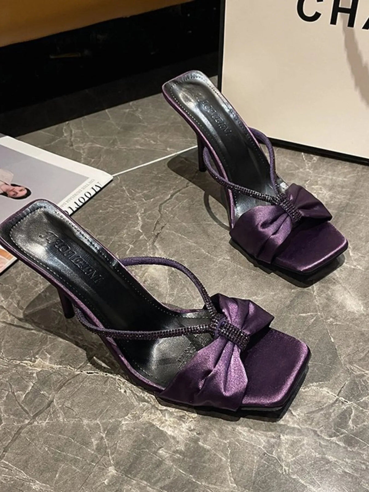 Elegant plush fashion hub faux leather mid-heel sandals with bow detail for women, showcasing stylish footwear design.