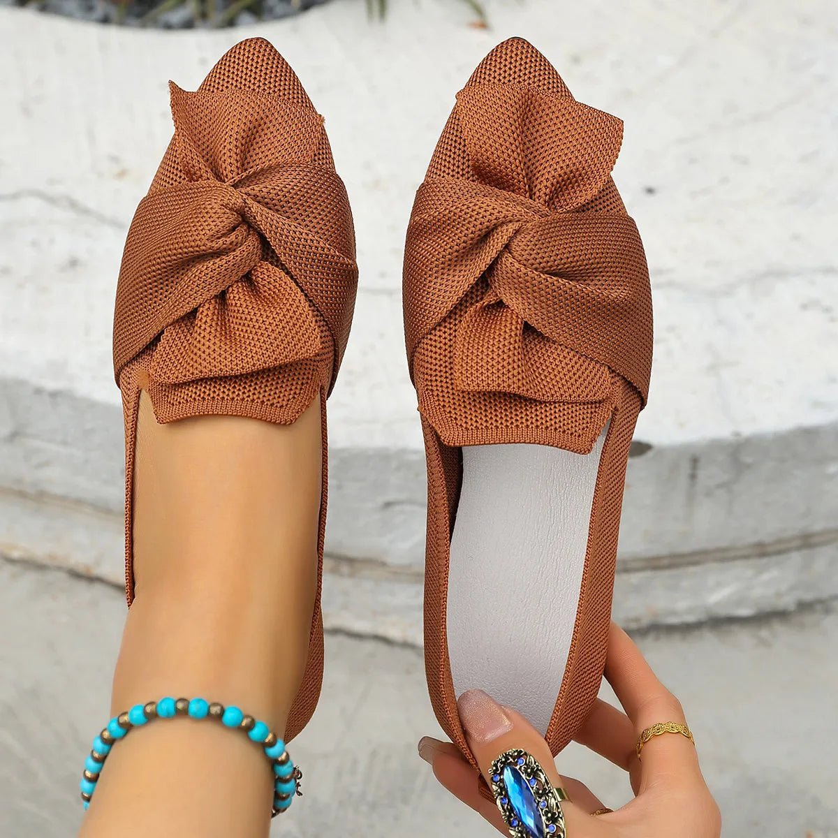 Elegant Plush Fashion Hub pointed toe flat slip-on shoes with bow embellishment and sleek design.