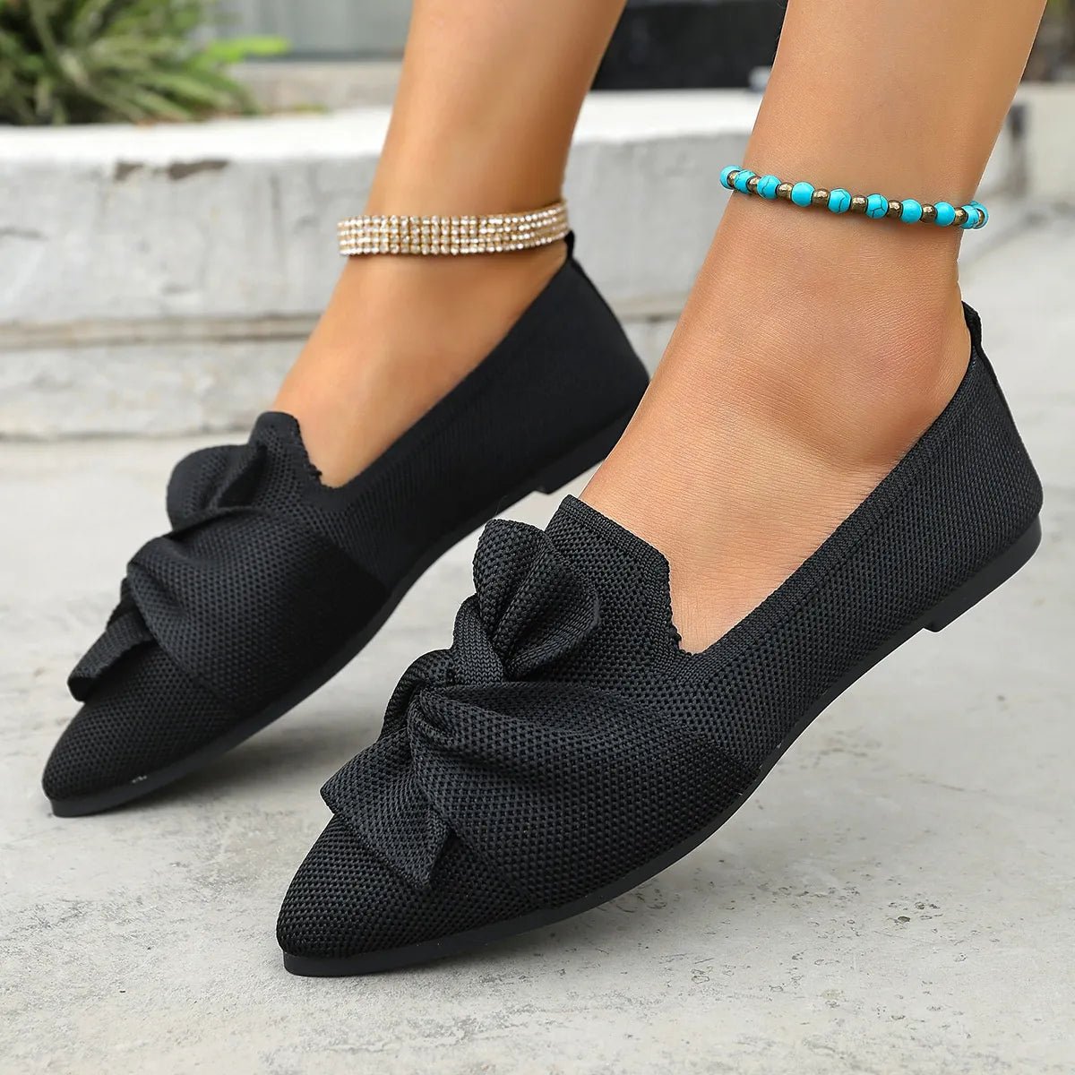 Elegant bow-embellished pointed toe flat slip-on shoes by Plush Fashion Hub, showcasing a sleek design and comfortable fit.
