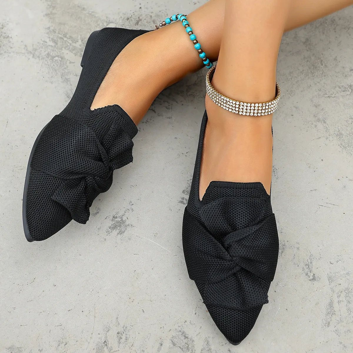 Plush Fashion Hub elegant pointed toe flat slip-on shoes with bow embellishment for a stylish and comfortable look.