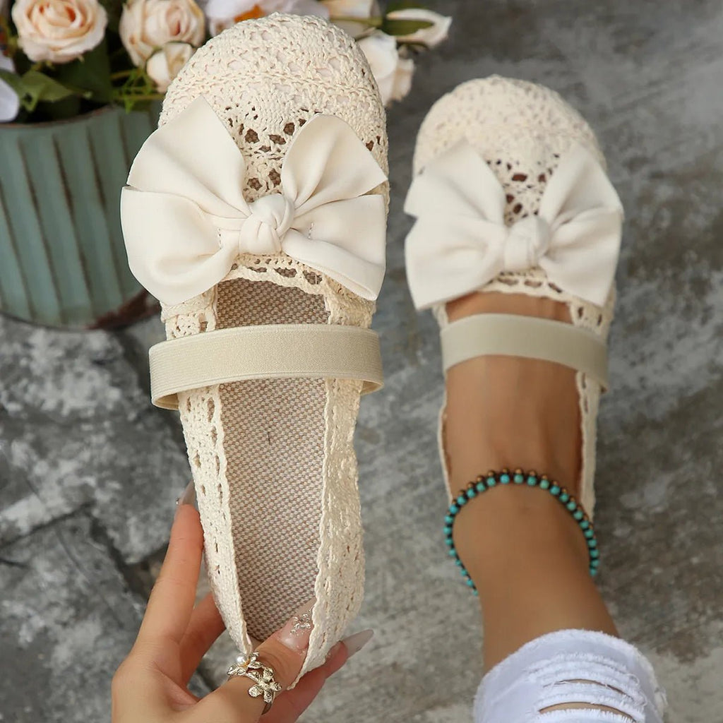 Women's chic round toe bow slip-on flats by Trendsi with breathable mesh fabric and comfortable design.