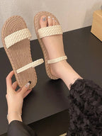 Women's braided-strap espadrille flat sandals with jute soles, casual summer footwear by Trendsi, perfect for warm weather.