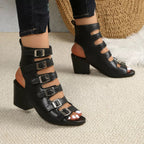 Women's buckle block heel sandals with mid-height heel and comfortable dress shoe style, perfect for stylish occasions.
